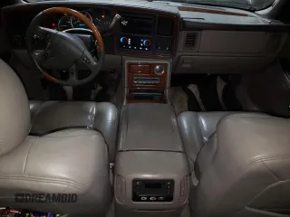 2003 Cadillac Escalade EXT z VIN 3GYEK63N33G118001, wystawiony jako Copart lot #86897574 z przebiegiem 223 953 mil mil oraz Szkoda całkowita • Salvage title. Historia ofert i sprzedaży dostępna na DreamBid. Obrazek 8.