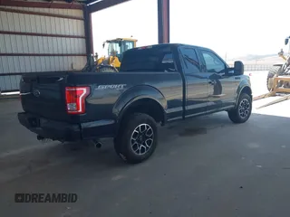 2015 Ford F-150 XLT z VIN 1FTFX1EFXFKE32133, wystawiony jako IAAI lot #42260644 z przebiegiem 136 724 mil mil oraz . Historia ofert i sprzedaży dostępna na DreamBid. Obrazek 4.