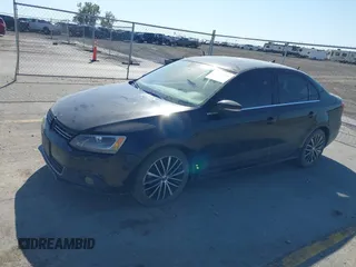 2012 Volkswagen Jetta Sedan SEL w/Sunroof with VIN 3VWLX7AJ2CM388825, listed as a IAAI auction lot 40490216 with 144,694 mi miles. Bid and sale history available at carsss.com. Image 2.