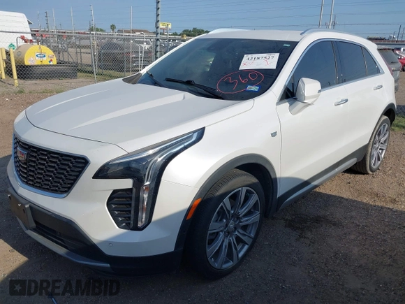 2022 Cadillac XT4 FWD Premium Luxury с VIN 1GYFZCR48NF138181, выставлен на аукционе IAAI как лот 42187527 с пробегом Не указан миль и . История ставок и продаж доступна на DreamBid. Изображение 2.