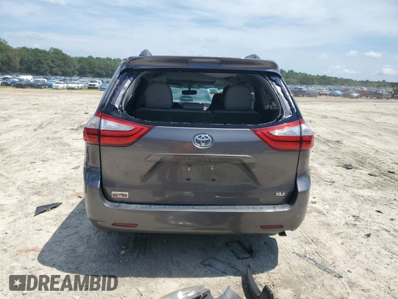 2015 Toyota Sienna XLE с VIN 5TDYK3DC7FS577620, выставлен на аукционе Copart как лот 65393635 с пробегом 179 998 миль миль и Чистый • Clean title. История ставок и продаж доступна на DreamBid. Изображение 6.