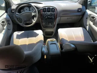 2001 Dodge Caravan Sport with VIN 2B8GP44G31R148820, listed as a Copart auction lot 64069494 with 70,125 mi miles and Salvage Title. Bid and sale history available at carsss.com. Image 8.