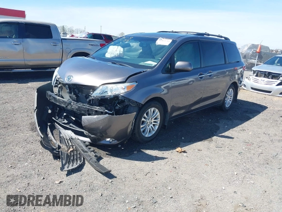 2015 Toyota Sienna XLE with VIN 5TDYK3DC4FS634937, listed as a IAAI auction lot 41869781 with 65,561 mi miles and . Bid and sale history available at carsss.com. Image 18.