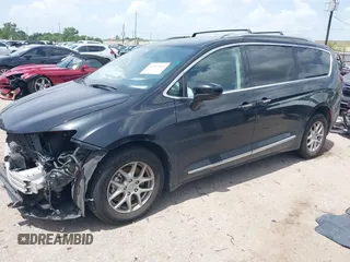 2020 Chrysler Pacifica Touring L with VIN 2C4RC1BG6LR173126, listed as a IAAI auction lot 42517961 with 75,014 mi miles and . Bid and sale history available at DreamBid. Image 18.
