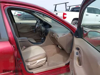 1998 Ford Taurus SE Comfort with VIN 1FAFP53S2WA255080, listed as a IAAI auction lot 41541015 with 196,604 mi miles. Bid and sale history available at carsss.com. Image 5.
