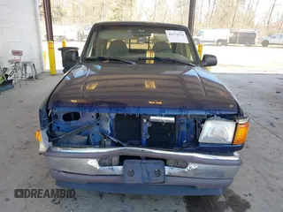 1997 Ford Ranger XLT with VIN 1FTCR14XXVPA34669, listed as a IAAI auction lot 41572934 with 81,917 mi miles. Bid and sale history available at carsss.com. Image 12.