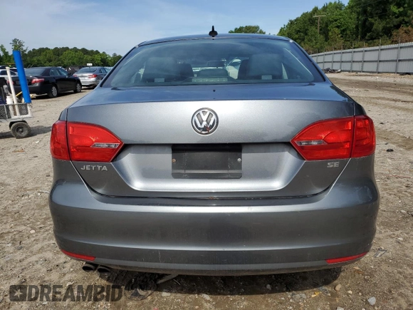 2014 Volkswagen Jetta SE with VIN 3VWD17AJ0EM246952, listed as a Copart auction lot 57507645 with 127,764 mi miles and Clean title. Bid and sale history available at DreamBid. Image 6.