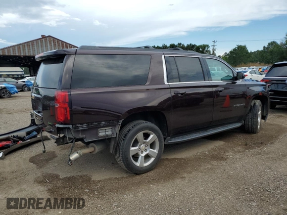 2020 Chevrolet Suburban LS z VIN 1GNSCGKC7LR218296, wystawiony jako Copart lot #61767105 z przebiegiem 118 405 mil mil oraz Szkoda całkowita • Salvage title. Historia ofert i sprzedaży dostępna na DreamBid. Obrazek 3.