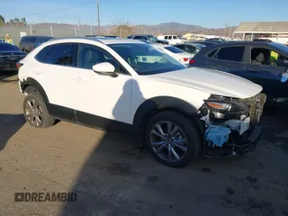 2023 Mazda CX-30 2.5 S Premium Package with VIN 3MVDMBDM4PM520769, listed as a IAAI auction lot 41371190 with 15,626 mi miles. Bid and sale history available at carsss.com. Image 1.