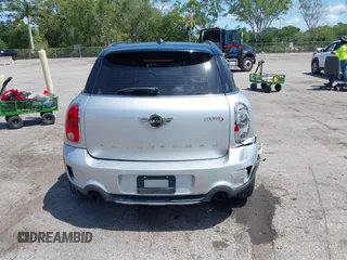 2015 MINI Countryman S z VIN WMWZC5C57FWP46371, wystawiony jako IAAI lot #42214115 z przebiegiem 87 234 mil mil oraz . Historia ofert i sprzedaży dostępna na DreamBid. Obrazek 16.