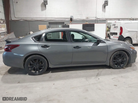 2018 Nissan Altima 2.5 SV with VIN 1N4AL3AP5JC470135, listed as a IAAI auction lot 41801045 with 122,452 mi miles. Bid and sale history available at carsss.com. Image 13.