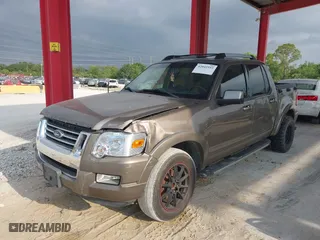 2007 Ford Explorer Sport Trac Limited with VIN 1FMEU33K87UA16163, listed as a IAAI auction lot 42042592 with 124,792 mi miles. Bid and sale history available at carsss.com. Image 6.