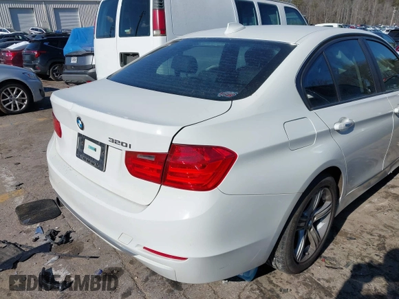 2013 BMW 3 Series 320i with VIN WBA3B1C56DF462549, listed as a IAAI auction lot 41411287 with 119,146 mi miles. Bid and sale history available at carsss.com. Image 4.
