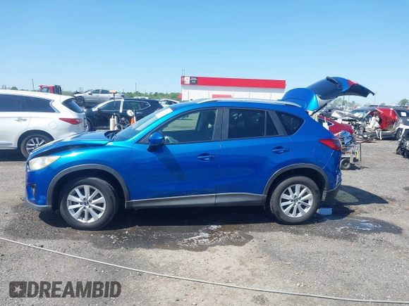 2013 Mazda CX-5 Touring with VIN JM3KE2CE4D0121155, listed as a IAAI auction lot 41983002 with 146,367 mi miles. Bid and sale history available at carsss.com. Image 14.