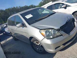 2005 Honda Odyssey EX-L z VIN 5FNRL38745B130258, wystawiony jako IAAI lot #42065115 z przebiegiem 195 000 mil mil oraz . Historia ofert i sprzedaży dostępna na DreamBid. Obrazek 1.