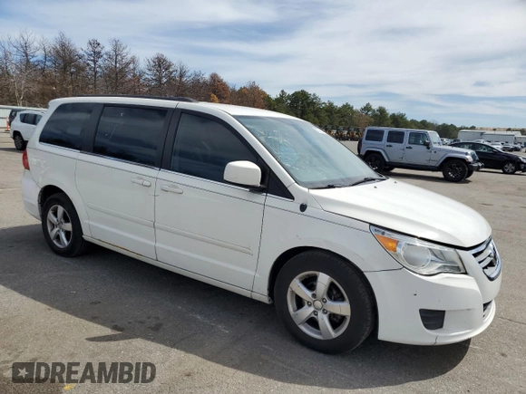 2011 Volkswagen Routan SE with VIN 2V4RW3DG5BR717538, listed as a Copart auction lot 50274824 with 174,033 mi miles and Clean title. Bid and sale history available at DreamBid. Image 4.