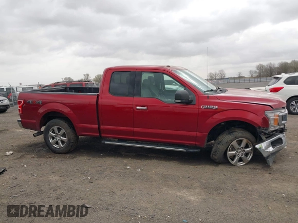 2018 Ford F-150 XL with VIN 1FTFX1E51JKF98962, listed as a IAAI auction lot 41827587 with 128,031 mi miles and . Bid and sale history available at DreamBid. Image 12.