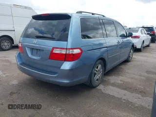 2007 Honda Odyssey EX-L with VIN 5FNRL38647B085123, listed as a IAAI auction lot 42154519 with 168,587 mi miles and . Bid and sale history available at carsss.com. Image 4.