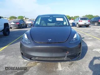 2024 Tesla Model Y с VIN 7SAYGDED4RF097142, выставлен на аукционе IAAI как лот 41484729 с пробегом 20 миль миль и . История ставок и продаж доступна на DreamBid. Изображение 6.