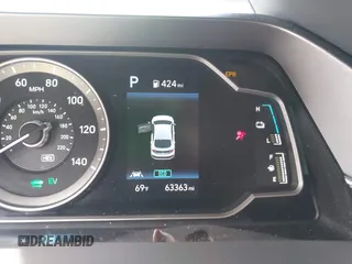 2021 Hyundai Ioniq SE with VIN KMHC65LD3MU249765, listed as a IAAI auction lot 41986977 with 63,363 mi miles and . Bid and sale history available at DreamBid. Image 16.