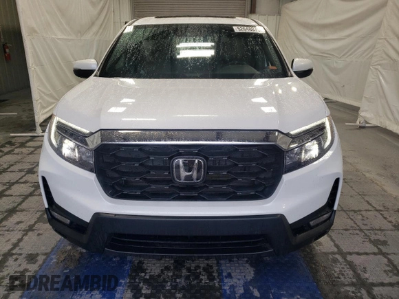 2024 Honda Passport EX-L с VIN 5FNYF8H54RB020153, выставлен на аукционе Copart как лот 59444465 с пробегом 13 958 миль миль и Списание • Salvage title. История ставок и продаж доступна на DreamBid. Изображение 5.