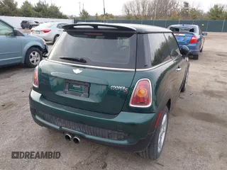 2007 MINI Hardtop S z VIN WMWMF73537TT84443, wystawiony jako IAAI lot #42018224 z przebiegiem 85 846 mil mil oraz . Historia ofert i sprzedaży dostępna na DreamBid. Obrazek 4.