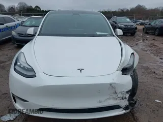 2021 Tesla Model Y Standard Range with VIN 5YJYGDED8MF114076, listed as a IAAI auction lot 41567295 with 150,133 mi miles and . Bid and sale history available at DreamBid. Image 11.