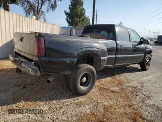 2005 GMC Sierra 1500 with VIN 1GTJC33235F813444, listed as a Copart auction lot 74541684 with 520,838 mi miles and Salvage Title. Bid and sale history available at DreamBid. Image 3.