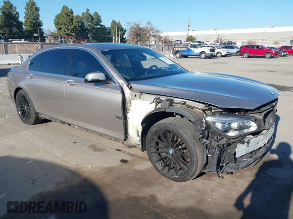 2015 BMW 7 Series 750Li with VIN WBAYE8C55FD782384, listed as a IAAI auction lot 41319363 with 75,784 mi miles. Bid and sale history available at carsss.com. Image 1.