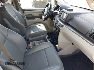 2012 Volkswagen Routan SE z VIN 2C4RVABG0CR193964, wystawiony jako IAAI lot #42122834 z przebiegiem 185 389 mil mil oraz . Historia ofert i sprzedaży dostępna na DreamBid. Obrazek 5.