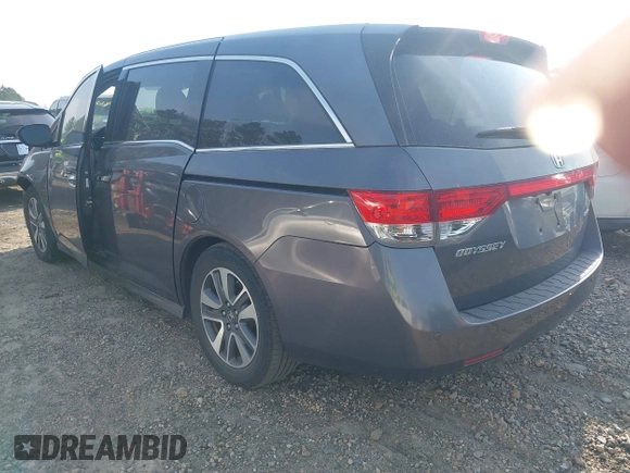 2016 Honda Odyssey Touring Elite with VIN 5FNRL5H92GB018560, listed as a IAAI auction lot 41796605 with 83,234 mi miles and . Bid and sale history available at carsss.com. Image 3.