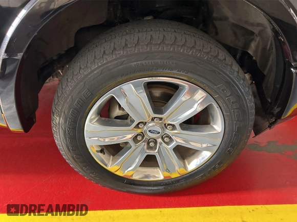 2019 Ford F-150 XL with VIN 1FTEW1E44KFC64781, listed as a IAAI auction lot 42825513 with 168,207 mi miles and . Bid and sale history available at DreamBid. Image 10.