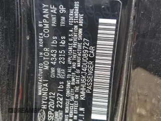2013 Hyundai Genesis Coupe Track z VIN KMHHU6KJ4DU089727, wystawiony jako Copart lot #50002495 z przebiegiem 99 869 mil mil oraz Szkoda całkowita • Salvage title. Historia ofert i sprzedaży dostępna na DreamBid. Obrazek 13.