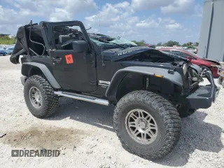 2007 Jeep Wrangler Rubicon with VIN 1J4GA64137L181809, listed as a Copart auction lot 53756665 with Not provided miles and Salvage title. Bid and sale history available at DreamBid. Image 4.