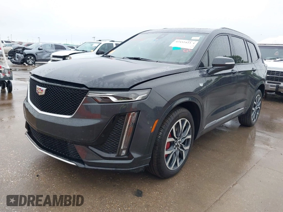 2023 Cadillac XT6 AWD Sport with VIN 1GYKPGRS0PZ177620, listed as a IAAI auction lot 42432423 with 24,070 mi miles and . Bid and sale history available at DreamBid. Image 2.