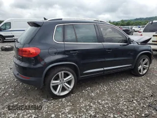 2014 Volkswagen Tiguan SEL with VIN WVGAV3AX7EW101796, listed as a Copart auction lot 60904345 with 97,652 mi miles and Salvage title. Bid and sale history available at DreamBid. Image 3.