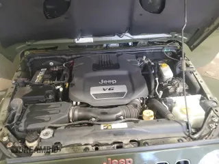 2016 Jeep Wrangler Sahara с VIN 1C4AJWBG5GL221617, выставлен на аукционе Copart как лот 48805755 с пробегом 70 883 миль миль и Списание • Salvage title. История ставок и продаж доступна на DreamBid. Изображение 12.