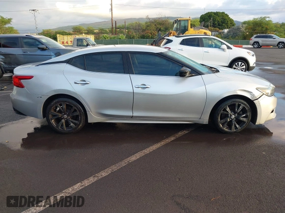 2016 Nissan Maxima S z VIN 1N4AA6AP1GC411633, wystawiony jako IAAI lot #41559508 z przebiegiem 95 240 mil mil oraz . Historia ofert i sprzedaży dostępna na DreamBid. Obrazek 13.
