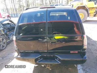 2000 GMC Denali with VIN 1GKEK13R1YR129862, listed as a IAAI auction lot 41833054 with 223,811 mi miles. Bid and sale history available at carsss.com. Image 16.