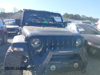 2022 Jeep Wrangler Unlimited Sport with VIN 1C4HJXDNXNW112324, listed as a IAAI auction lot 41376149 with 69,435 mi miles and . Bid and sale history available at DreamBid. Image 12.