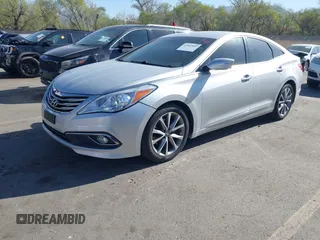 2015 Hyundai Azera z VIN KMHFG4JG0FA453994, wystawiony jako IAAI lot #42002922 z przebiegiem 102 094 mil mil oraz . Historia ofert i sprzedaży dostępna na DreamBid. Obrazek 17.