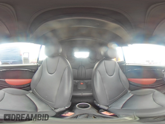 2012 MINI Convertible with VIN WMWZN3C58CT134224, listed as a Copart auction lot 57610015 with 141,394 mi miles and Salvage title. Bid and sale history available at DreamBid. Image 14.