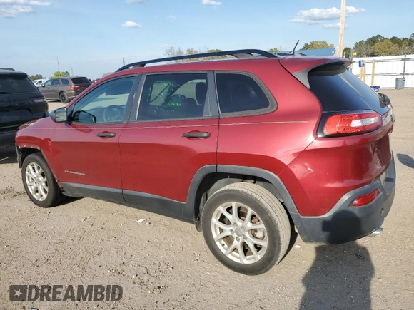 2016 Jeep Cherokee Sport with VIN 1C4PJLABXGW258322, listed as a Copart auction lot 51008975 with 128,865 mi miles and Salvage title. Bid and sale history available at DreamBid. Image 2.