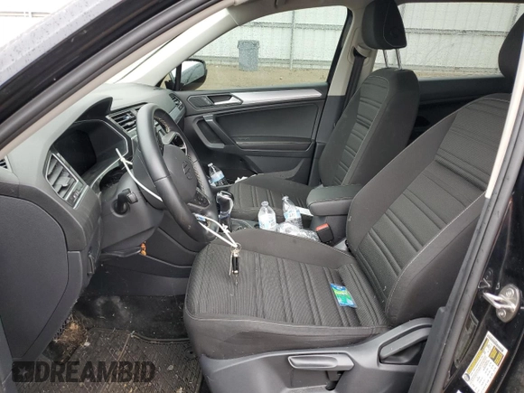 2023 Volkswagen Tiguan S with VIN 3VVRB7AX0PM038326, listed as a Copart auction lot 56350825 with 50,013 mi miles and Salvage title. Bid and sale history available at DreamBid. Image 7.