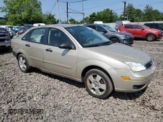 2006 Ford Focus S z VIN 1FAFP34N96W111431, wystawiony jako Copart lot #59478815 z przebiegiem Nie podano mil oraz Szkoda całkowita • Salvage title. Historia ofert i sprzedaży dostępna na DreamBid. Obrazek 4.