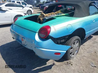 2002 Ford Thunderbird Hardtop Premium z VIN 1FAHP60AX2Y116343, wystawiony jako IAAI lot #42291076 z przebiegiem Nie podano mil oraz . Historia ofert i sprzedaży dostępna na DreamBid. Obrazek 6.