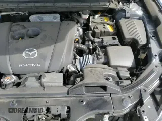 2024 Mazda CX-5 S Carbon Edition с VIN JM3KFBCL3R0504166, выставлен на аукционе Copart как лот 85106135 с пробегом 24 856 миль миль и Чистый • Clean title. История ставок и продаж доступна на DreamBid. Изображение 14.