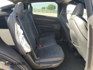 2023 Tesla Model X with VIN 7SAXCDE5XPF422163, listed as a Copart auction lot 52573185 with Not Provided miles and Salvage Title. Bid and sale history available at DreamBid. Image 10.