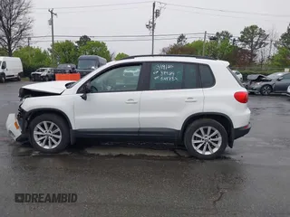 2015 Volkswagen Tiguan SE z VIN WVGBV7AX5FW584833, wystawiony jako IAAI lot #41855476 z przebiegiem 123 299 mil mil oraz . Historia ofert i sprzedaży dostępna na DreamBid. Obrazek 14.
