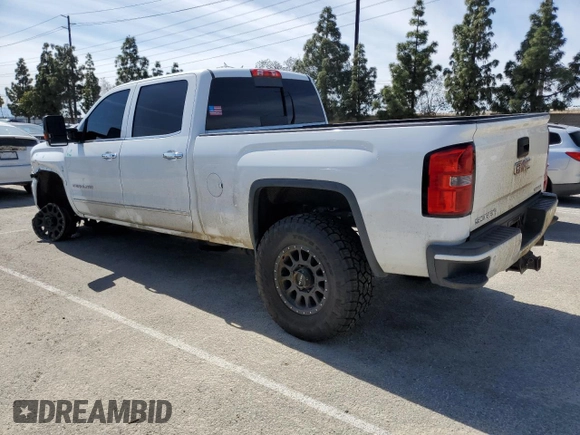 2015 GMC Sierra 2500HD available WiFi Denali with VIN 1GT120E80FF659215, listed as a Copart auction lot 48356455 with 134,796 mi miles and Salvage Title. Bid and sale history available at carsss.com. Image 2.